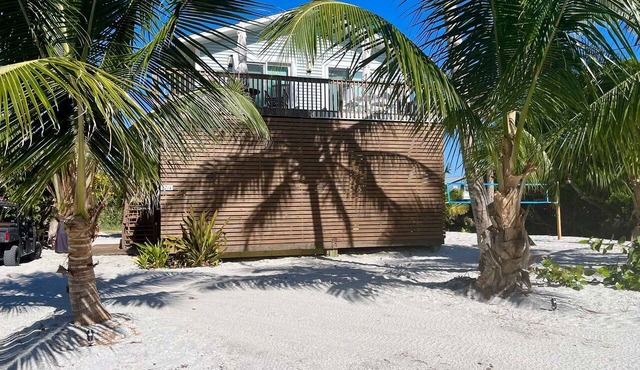 Charming Beachfront Cottage with Dock Slip and Kayaks on Little Gasparilla Island | Placida, FL in Placida