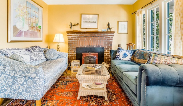 Dog-friendly waterfront home with private hot tub, views & wood stove