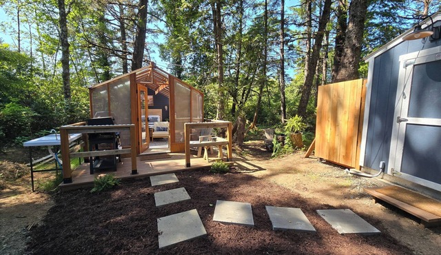 Experience Coastal Bliss in a Stunning Glass House Glamping Retreat