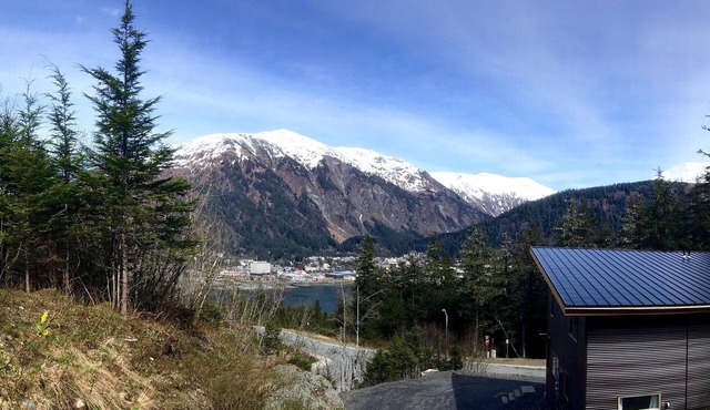 Home with a stunning view, close to trails and town