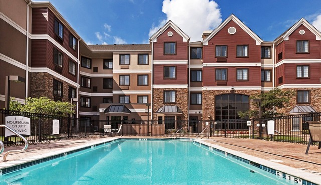 King Suite in Tulsa | Free Breakfast + Fitness Center + Seasonal Outdoor Pool