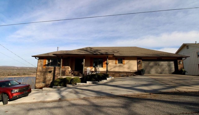 Luxury Lakeview Home with Expansive Two-Level Deck Near Beaver Lake | Rogers, Arkansas