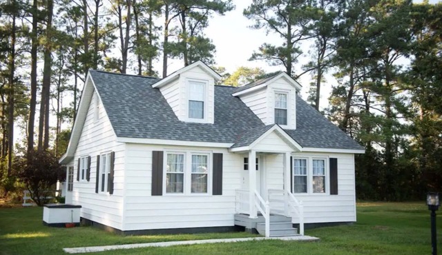 Mid-century modern meets classic cape on the coast.
