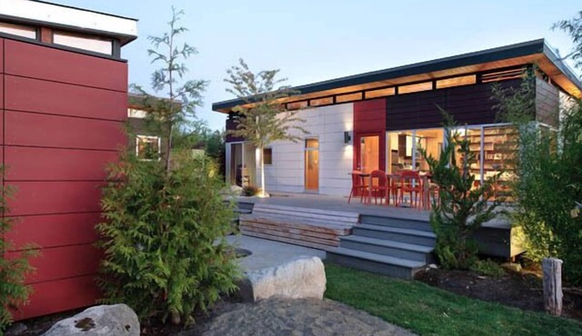Modern Cottage Compound With Decks And Outdoor Fire Pit