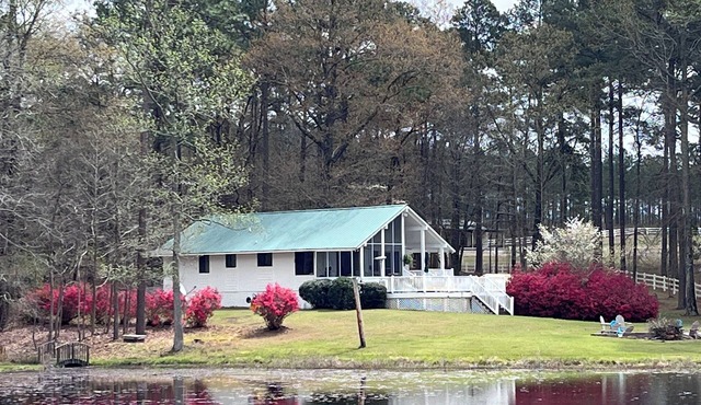 Private Retreat! 200 private gated acres with two ponds.