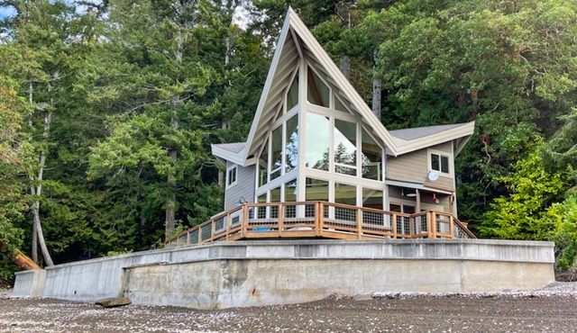 Stunning waterfront property with private beach, amazing views, and huge loft