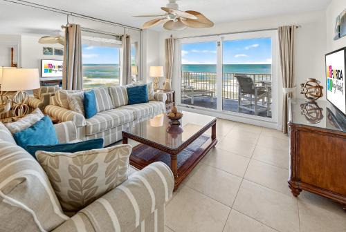 Updated direct oceanfront 2/2, corner condo with private balcony, heated pool and garage